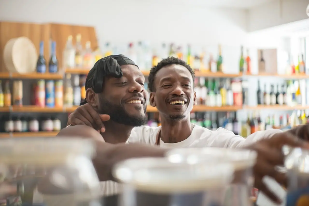 A joyful couple shopping in a store, embracing each other with smiles.